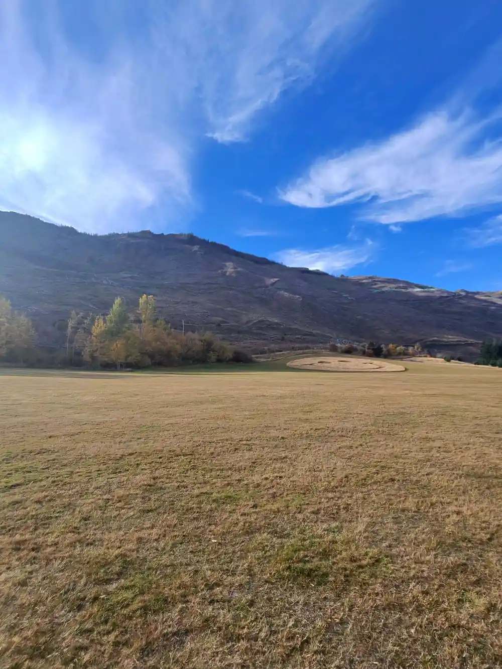 The dry grass of the landing field